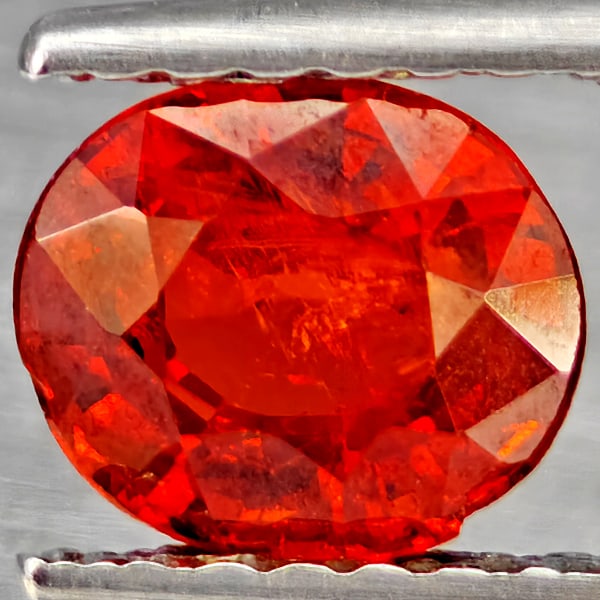 Natural Orangish Red Spessartine Garnet Gemstones 1.21 Ct. Oval Shape 6.3 x 5.5 Mm.: Product ID: 802937290 Product Name: Natural Garnet Weight: 1.21 CT. Size: 6.3 x 5.5 x 4 MM. Shape: Oval Shape Color: Orangish Red Clarity:SI1 Luster: Good Gems Origin: Namibia Treatment: Unheated Crys