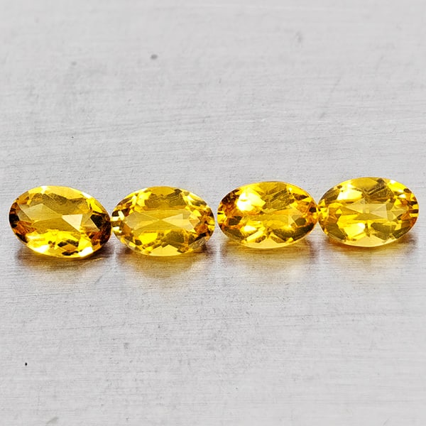 Natural Yellow Citrine Gemstones 1.79 Ct. 4 Pcs. Oval Checkerboard Cut 6.1 x 4 Mm.: Product ID: 801815169 Product Name: Natural Citrine Weight: 1.79 CT. Size: 6.1 x 4 x 3.6 MM. Shape: Oval Checkerboard Cut Color: Yellow Clarity:VVS - VSI Luster: Good Gems Origin: Brazil Treatment: Un