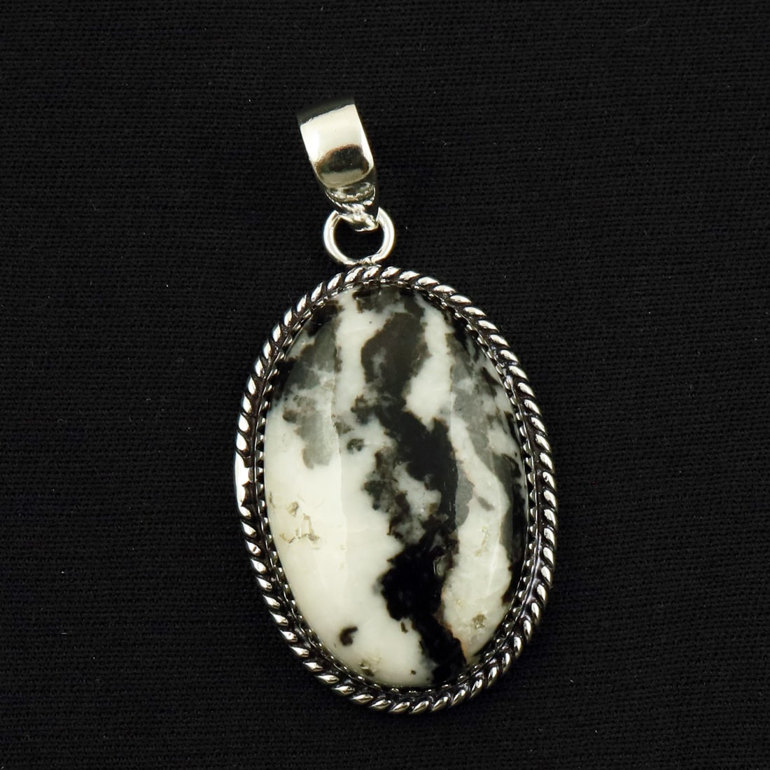 Natural Zebra Jasper Sterling Silver Plated Handmade Pendant: Product ID: 260714170914 Product - Handmade Silver Plated Pendant Metal - 92.5 Sterling Silver Plated Pendant Size - 3.5x2.5 CM Gemstone - Zebra Jasper Gemstone Origin - Africa Gemstone Shape - Oval P
