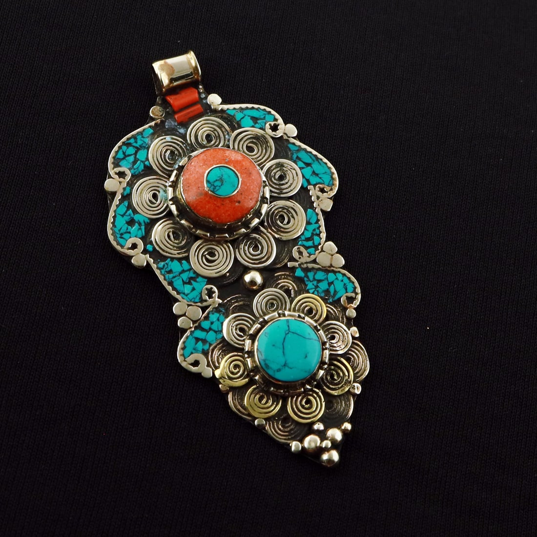 Tibetan Turquoise & Coral Handmade Ethnic Pendant: Product ID: 260721180628 Product - Tibetan Handmade Ethnic Pendant Pendant Size - 8X4 CM Pendant Weight - 26 Gram Gemstone - Turquoise & Coral Metal - Brass & Copper mix Metal Origin - Nepal Country/R