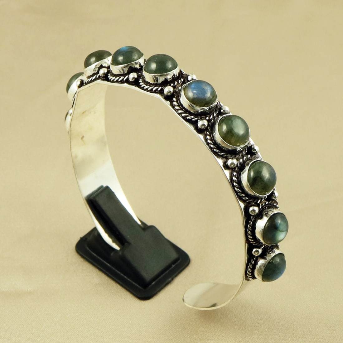 Natural 8MM Labradorite Sterling Silver Plated Handmade Cuff Bangle: Product ID: 260709164316 Product - Handmade Silver Plated Cuff Bangle Metal - 92.5 Sterling Silver Plated Bangle Size - 6.5x5.5 CM (Adjustable) Gemstone - Labradorite Gemstone Origin - Canada Gemstone