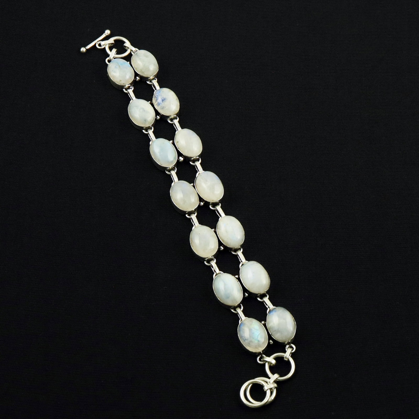 Natural Rainbow Moonstone Sterling Silver Plated Handmade Bracelet: Product ID: 260701143341 Product - Handmade Silver Plated Bracelet Metal - 92.5 Sterling Silver Plated Bracelet Length - 6 Inch + 2 Inch Gemstone - Rainbow Moonstone Gemstone Size - 10X14 MM( 14 Stone