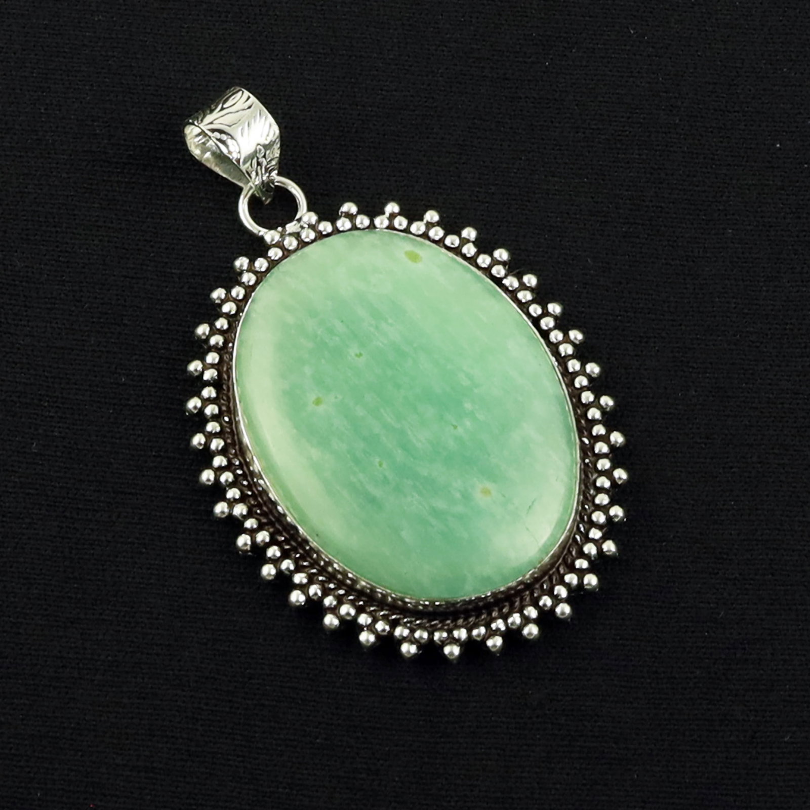 Natural Amazonite Sterling Silver Plated Handmade Pendant: Product ID: 260619170916 Product - Handmade Silver Plated Pendant Metal - 92.5 Sterling Silver Plated Pendant Size - 4x3 CM Gemstone - Amazonite Gemstone Origin - Brazil Gemstone Shape - Oval Pendant 