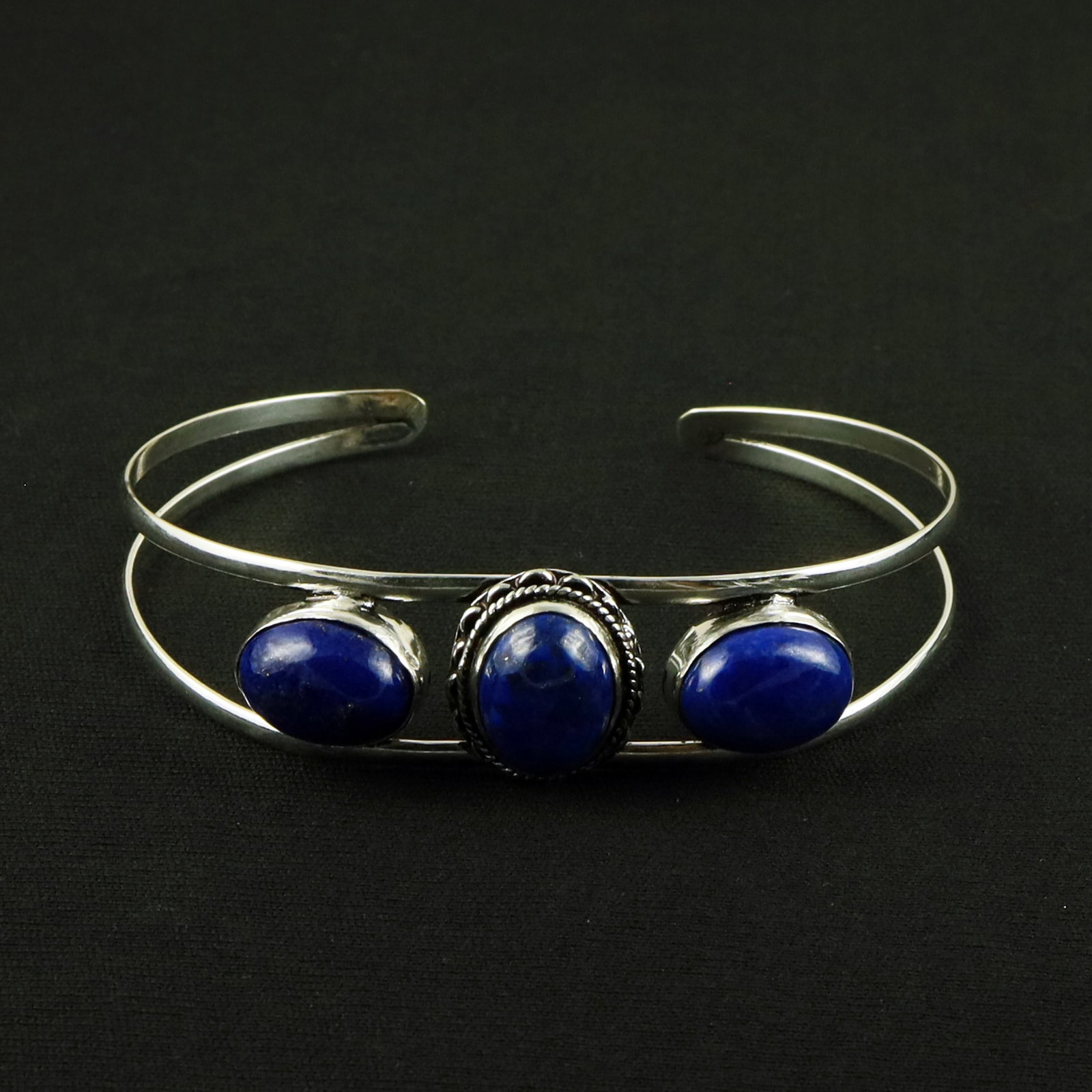 Natural Lapis Lazuli Sterling Silver Plated Handmade Cuff Bangle: Product ID: 260612171046 Product - Handmade Silver Plated Cuff Bangle Metal - 92.5 Sterling Silver Plated Bangle Size - 7.5x5.5 CM (Adjustable) Gemstone - Lapis Lazuli Gemstone Origin - Afghanistan Ge