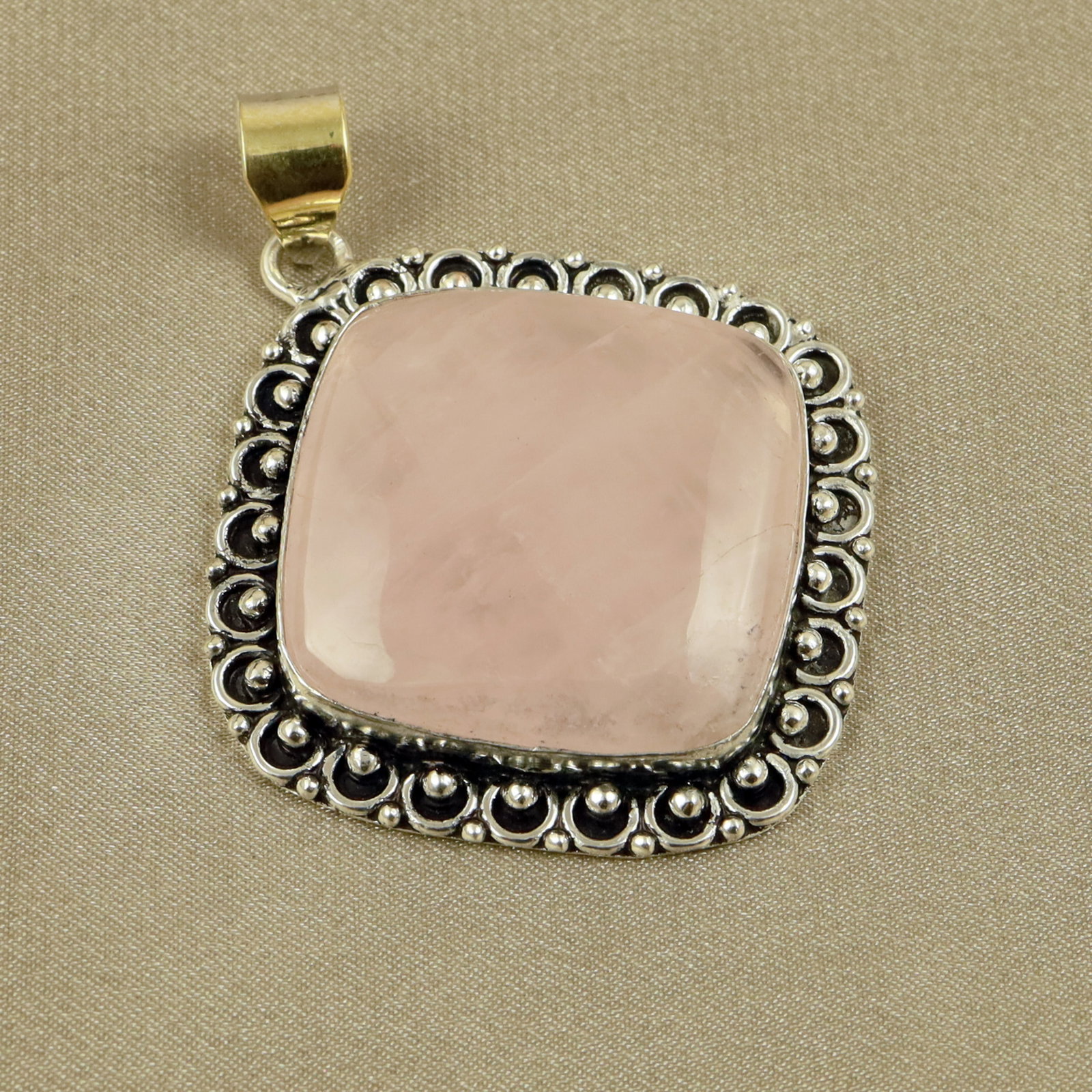 Natural Rose Quartz Sterling Silver Plated Handmade Pendant: Product ID: 260518131921 Product - Handmade Silver Plated Pendant Metal - 92.5 Sterling Silver Plated Pendant Size - 3.5x3.5CM Gemstone - Rose Quartz Gemstone Origin - Brazil Gemstone Shape - Square P