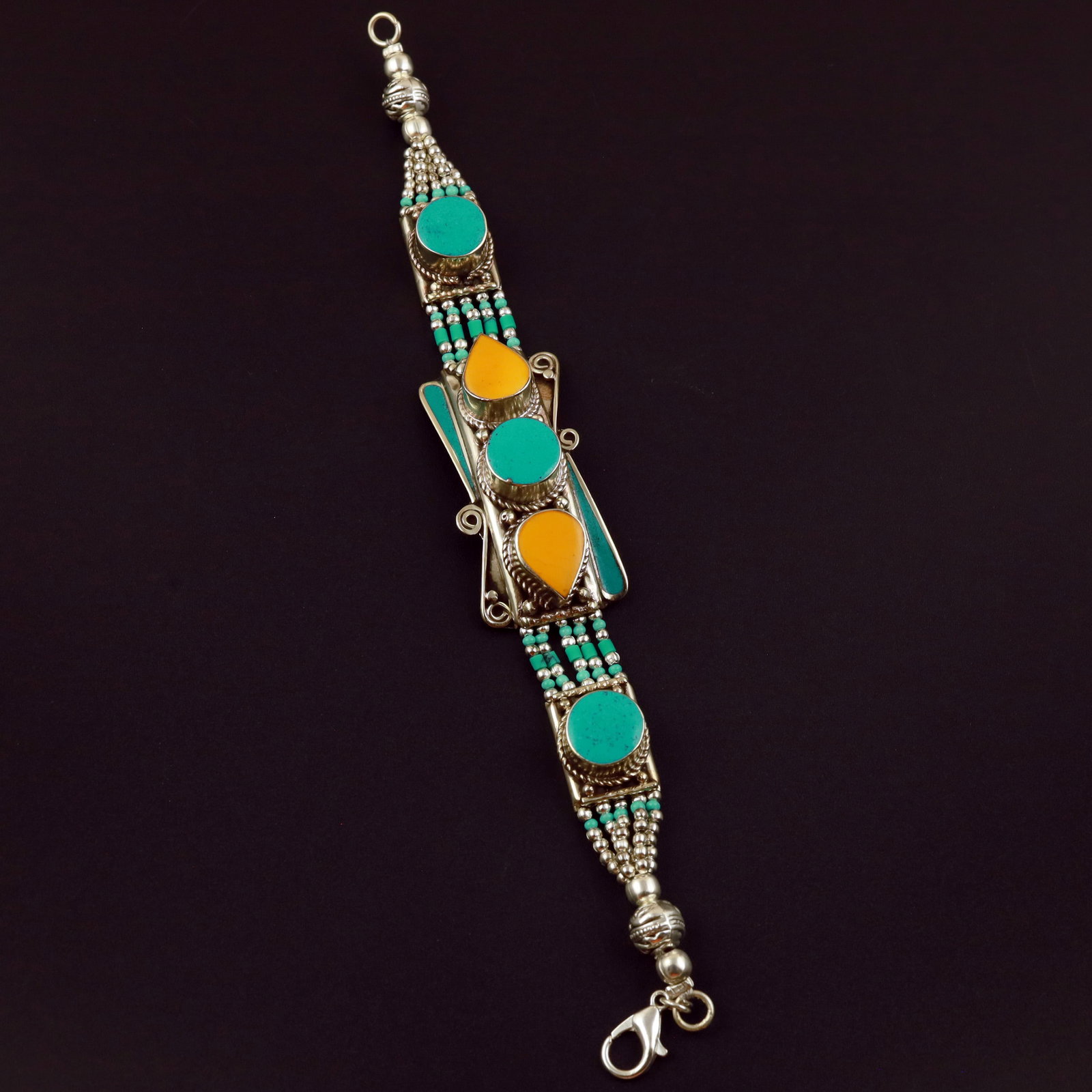Tibetan Turquoise & Copal Handmade Royal Bracelet: Product ID: 260513131922 Product - Tibetan Handmade Ethnic Bracelet Gemstone - Natural Turquoise & Copal Size - 7 Inch Weight - 50 Gram Approx Metal - Brass & Copper mix Metal Origin - Nepal Country/R