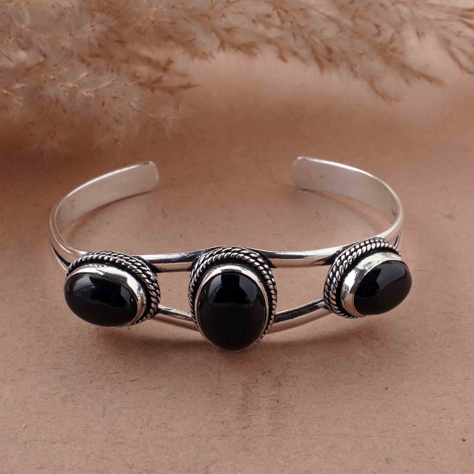 Natural Black Onyx Sterling Silver Plated Handmade Cuff Bangle: Product ID: 260429153853 Product - Handmade Silver Plated Cuff Bangle Metal - 92.5 Sterling Silver Plated Bangle Size - 6.5x4.5 CM (Adjustable) Gemstone - Black Onyx Gemstone Origin - India Gemstone S
