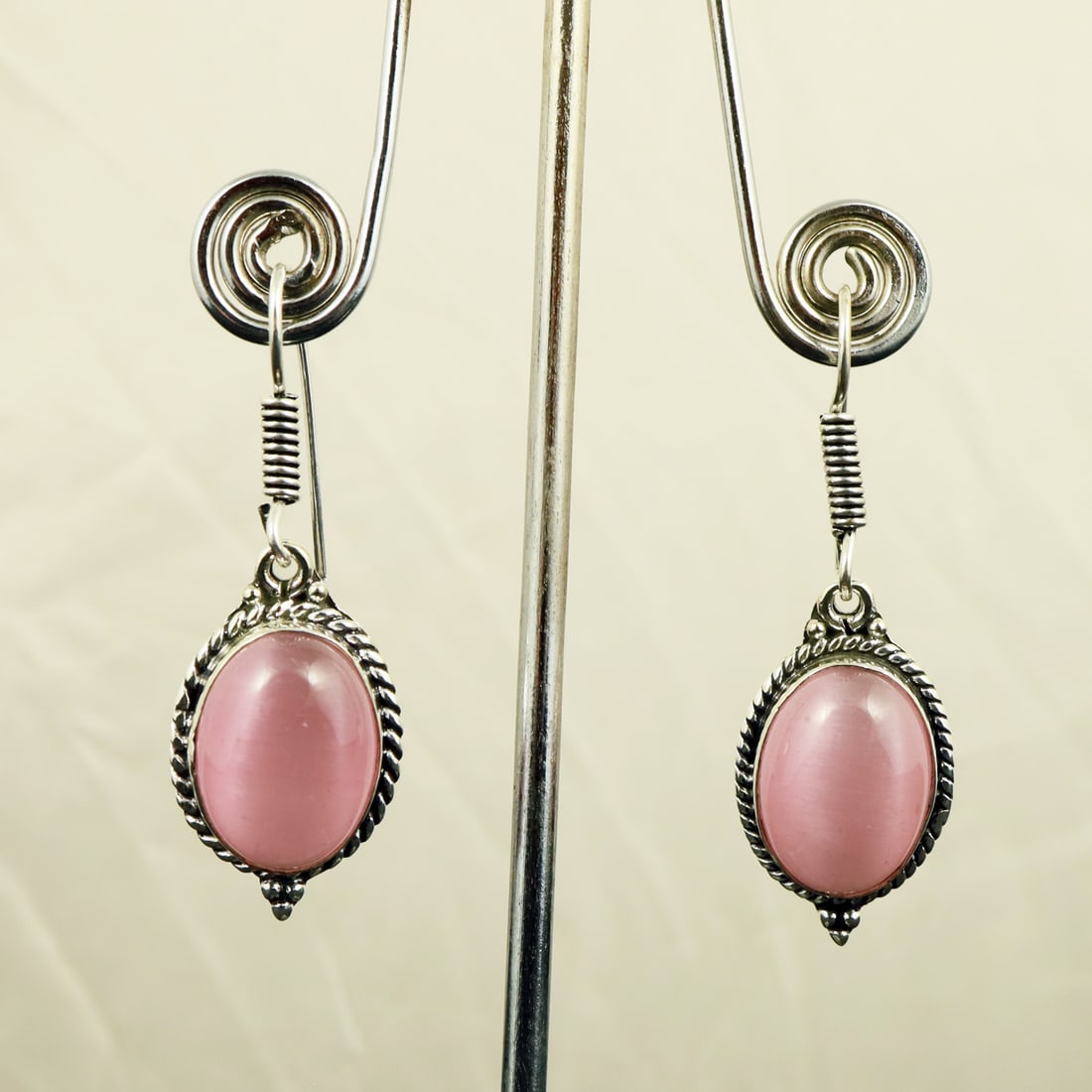 Natural Monalisa Sterling Silver Plated Handmade Stud Earring: Product ID: 260722100848 Product - Handmade Silver Plated Stud Earring Metal - 92.5 Sterling Silver Plated Earring Type - Stud Gemstone - Monalisa Gemstone Origin -India Gemstone Size - 12X16 MM ( 2 S