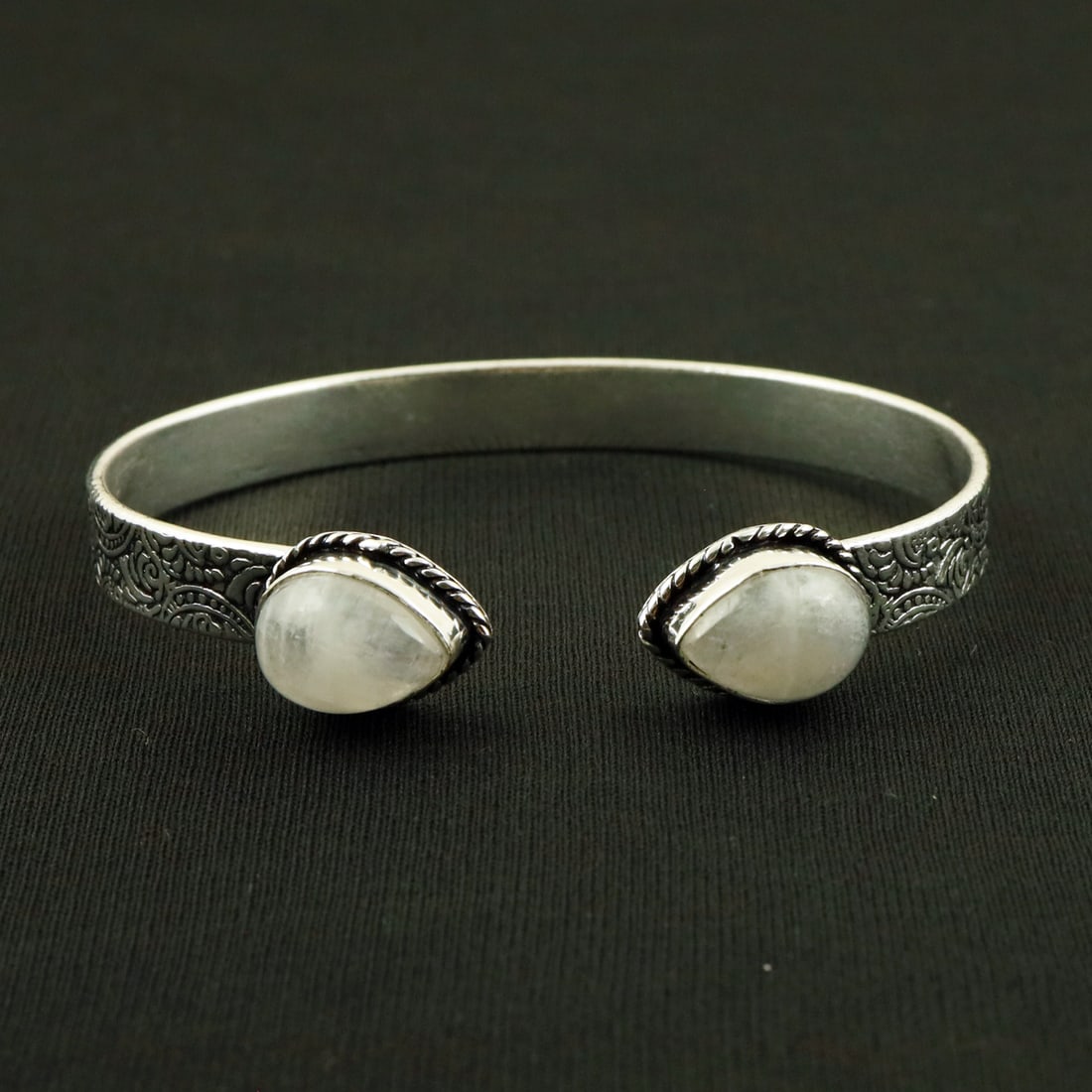 Natural Rainbow Moonstone Sterling Silver 2-Micron Plated Handmade Cuff Bangle: Product ID: 260716152535 Product - Handmade Silver Plated Cuff Bangle Metal - 92.5 2-Micron Sterling Silver Plated Bangle Size - 7x5 CM (Adjustable) Gemstone - Rainbow Moonstone Gemstone Origin - Indi
