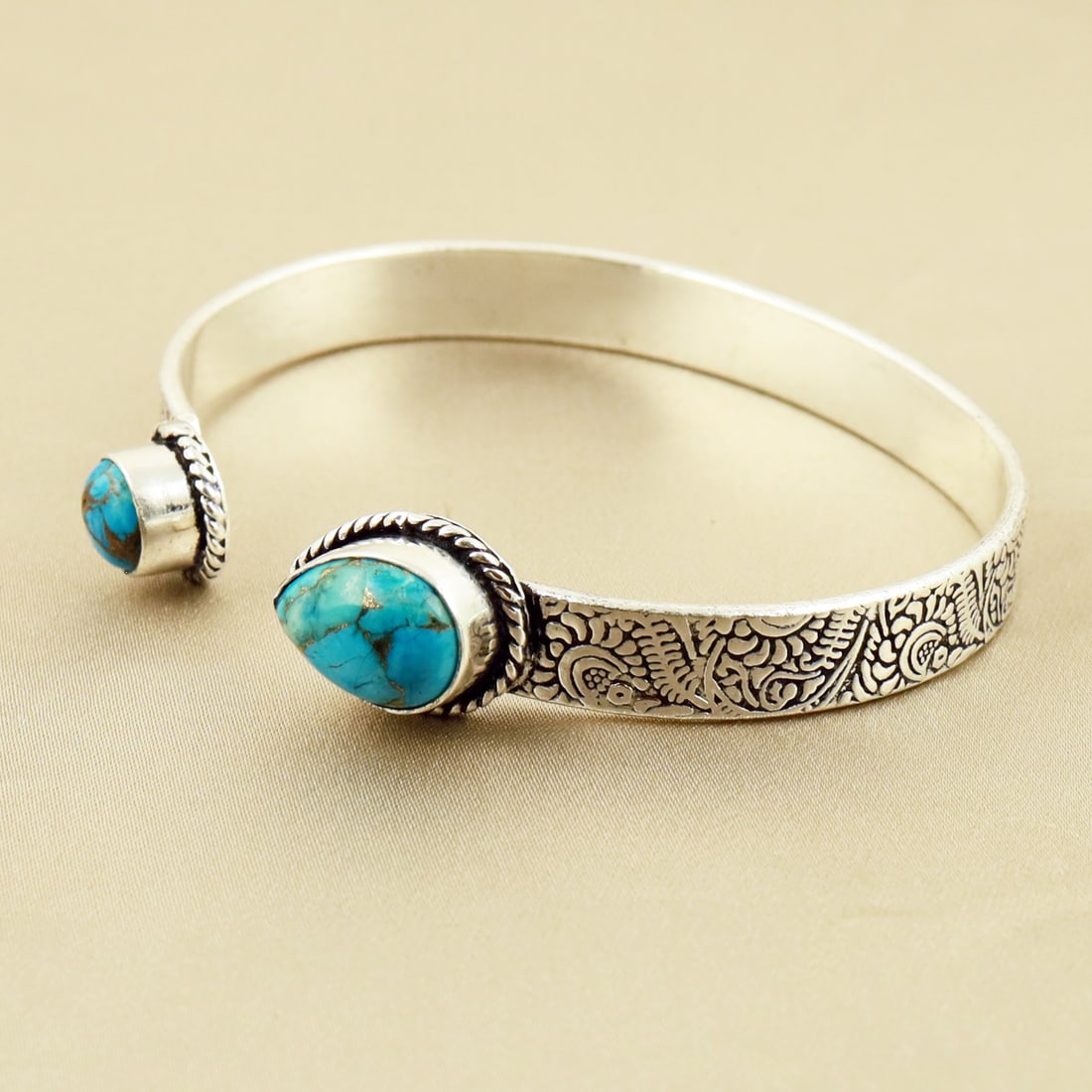 Natural Kingman Turquoise Sterling Silver 2-Micron Plated Handmade Cuff Bangle: Product ID: 260716145613 Product - Handmade Silver Plated Cuff Bangle Metal - 92.5 2-Micron Sterling Silver Plated Bangle Size - 6.5x5 CM (Adjustable) Gemstone - Kingman Turquoise Gemstone Origin - Un