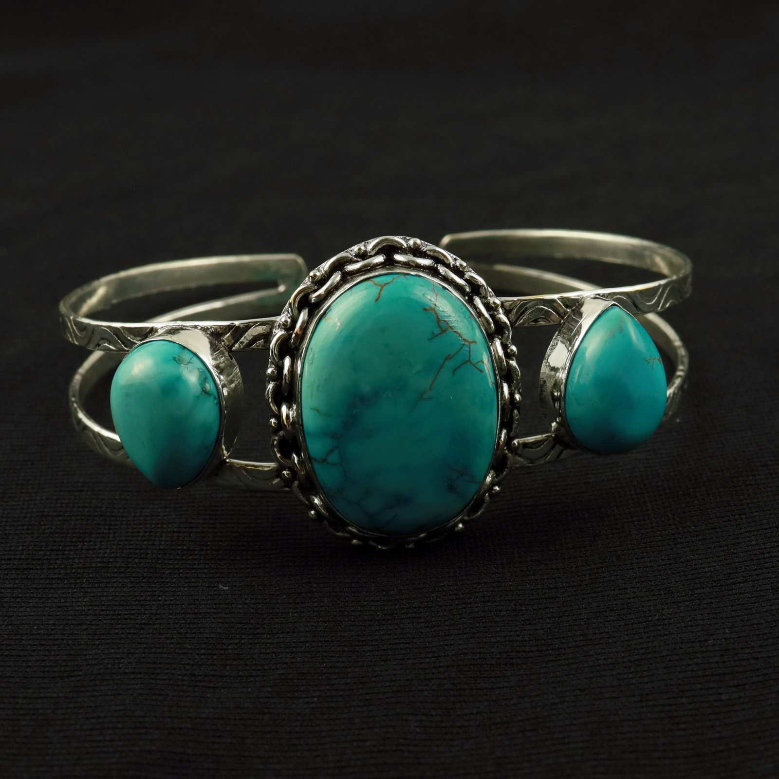 Natural Turquoise Sterling Silver Plated Handmade Cuff Bangle: Product ID: 260520144516 Product - Handmade Silver Plated Cuff Bangle Metal - 92.5 Sterling Silver Plated Bangle Size - 7.5x5.5 CM (Adjustable) Gemstone - Turquoise Gemstone Origin - Tibet Gemstone Si