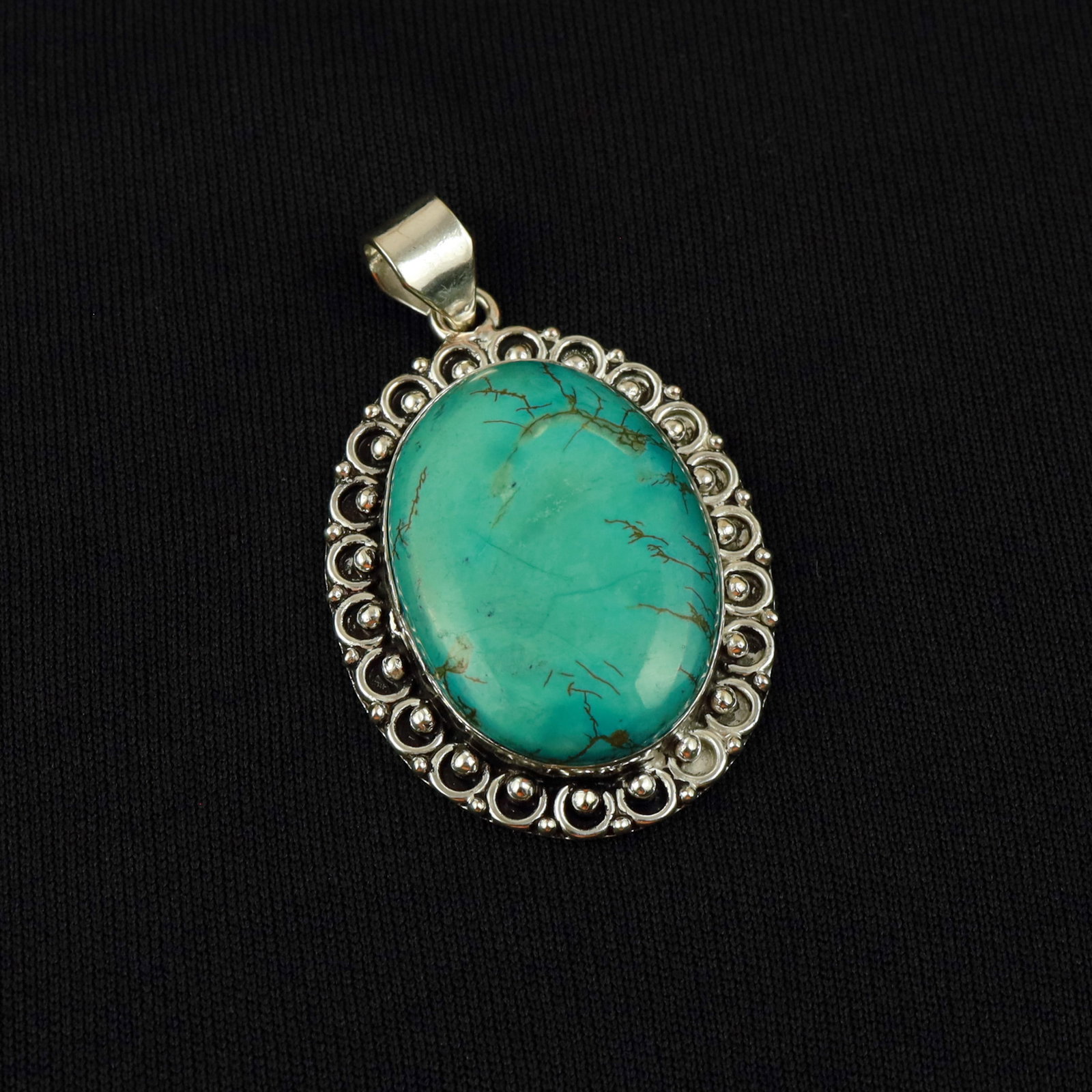 Natural Turquoise Sterling Silver Plated Handmade Pendant: Product ID: 260517183943 Product - Handmade Silver Plated Pendant Metal - 92.5 Sterling Silver Plated Pendant Size - 4x3 CM Gemstone - Turquoise Gemstone Origin - Tibet Gemstone Shape - Oval Pendant W