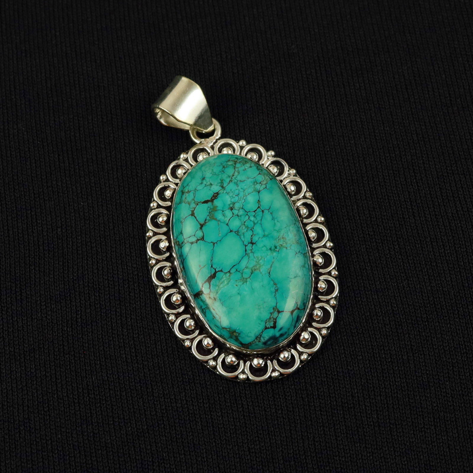 Natural Turquoise Sterling Silver Plated Handmade Pendant: Product ID: 260517183801 Product - Handmade Silver Plated Pendant Metal - 92.5 Sterling Silver Plated Pendant Size - 4.5x3 CM Gemstone - Turquoise Gemstone Origin - Tibet Gemstone Shape - Oval Pendant