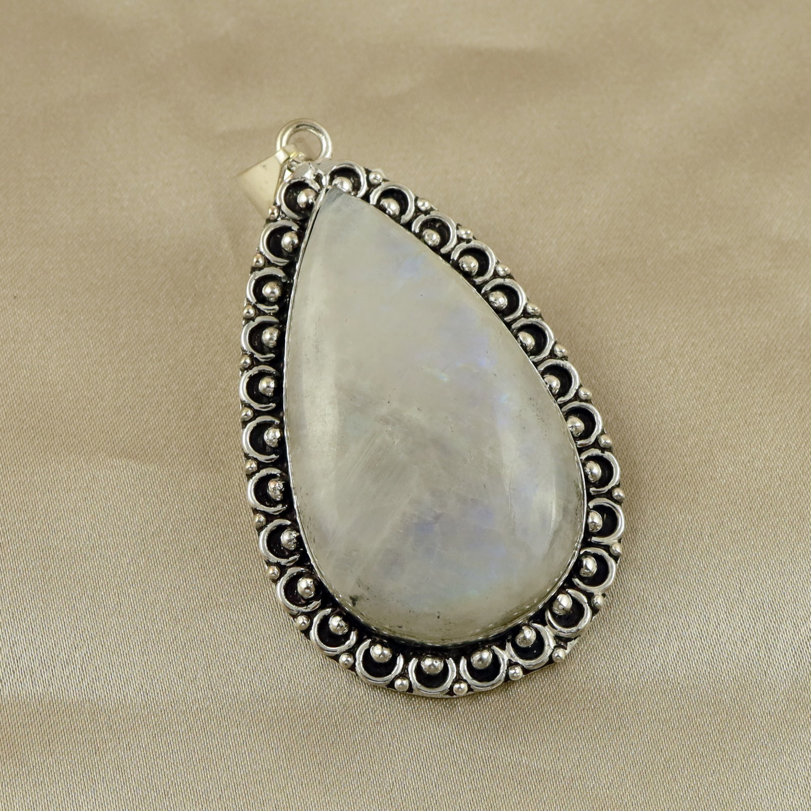 Natural Rainbow Moonstone Sterling Silver Plated Handmade Pendant: Product ID: 260513111823 Product - Handmade Silver Plated Pendant Metal - 92.5 Sterling Silver Plated Pendant Size - 5x3.5 CM Gemstone - Rainbow Moonstone Gemstone Origin - India Gemstone Shape - Pear