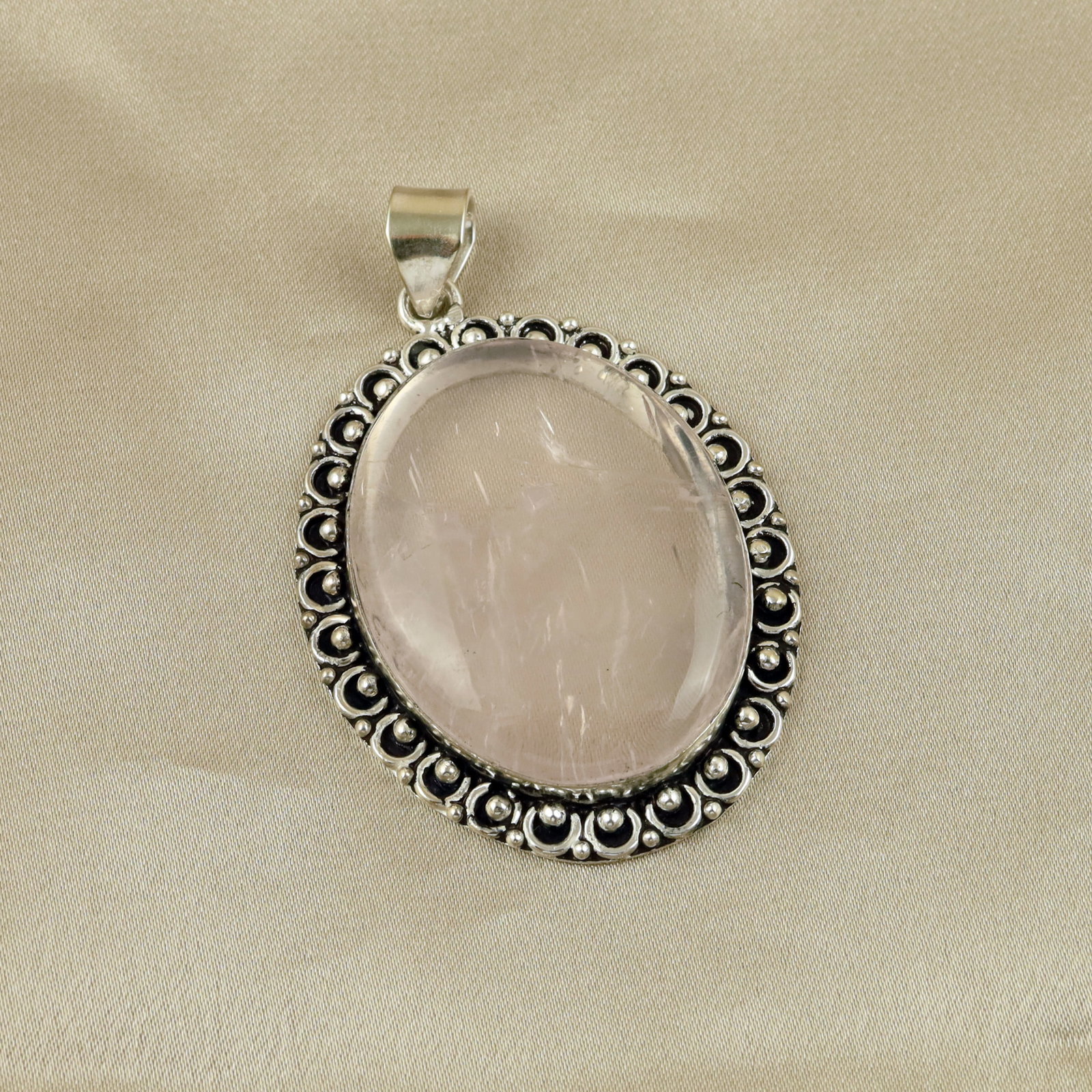 Natural Rose Quartz Sterling Silver Plated Handmade Pendant: Product ID: 260513110530 Product - Handmade Silver Plated Pendant Metal - 92.5 Sterling Silver Plated Pendant Size - 4.5x4 CM Gemstone - Rose Quartz Gemstone Origin - Brazil Gemstone Shape - Oval Pend