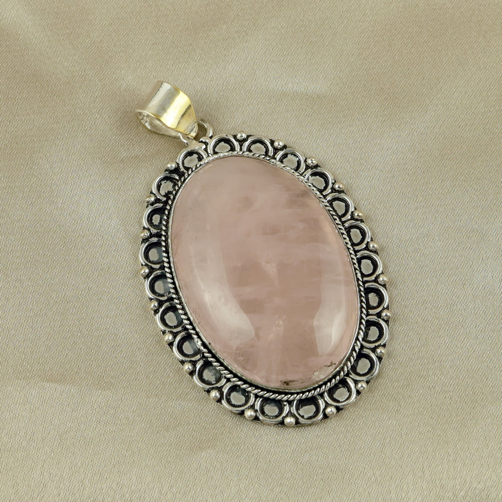 Natural Rose Quartz Sterling Silver Plated Handmade Pendant: Product ID: 260513110454 Product - Handmade Silver Plated Pendant Metal - 92.5 Sterling Silver Plated Pendant Size - 5x3.5 CM Gemstone - Rose Quartz Gemstone Origin - Brazil Gemstone Shape - Oval Pend