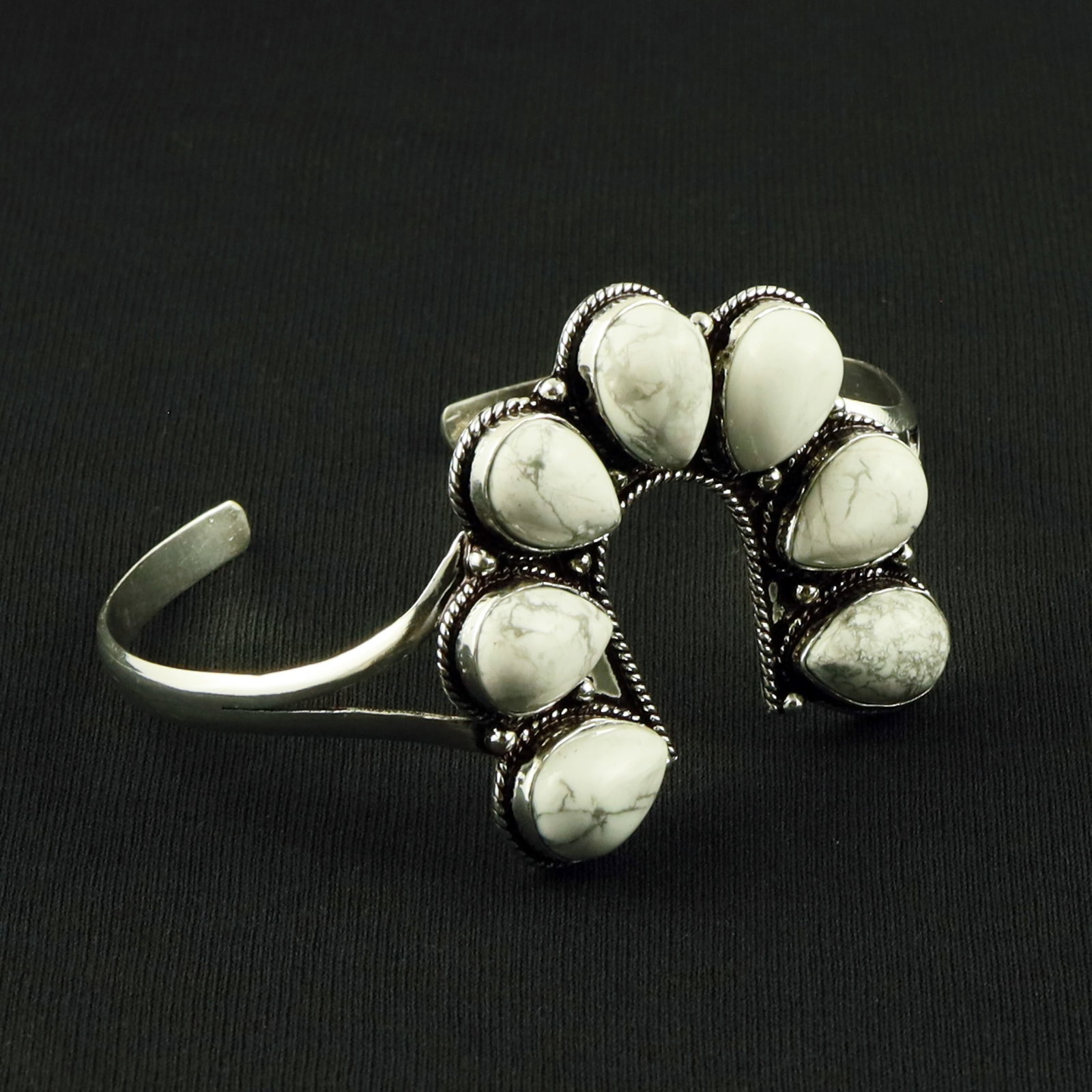 Natural Howlite Sterling Silver Plated Handmade Cuff Bangle: Product ID: 260617115452 Product - Handmade Silver Plated Cuff Bangle Metal - 92.5 Sterling Silver Plated Bangle Size - 7.5x5 CM (Adjustable) Gemstone - Howlite Gemstone Origin - Canada Gemstone Size 