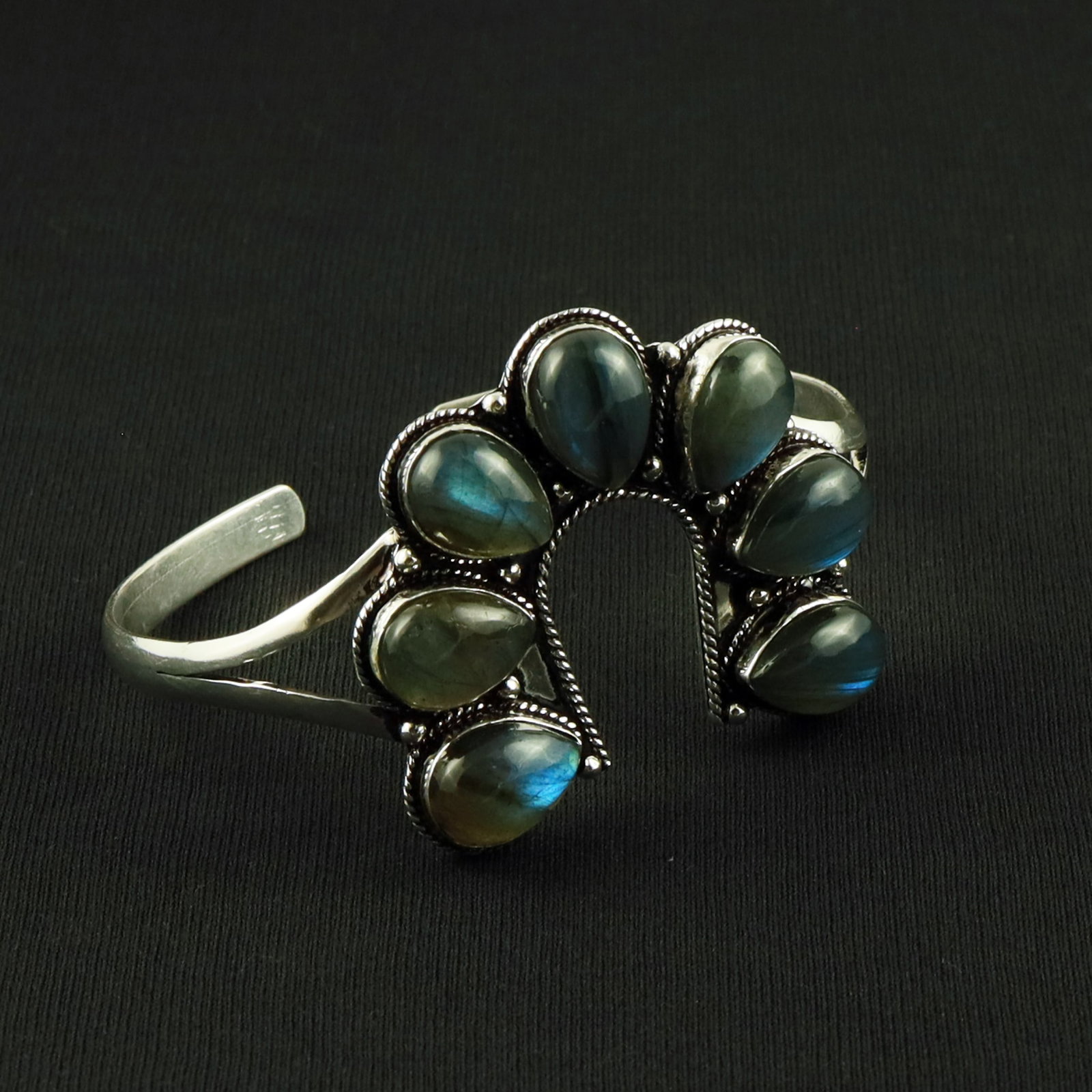 Natural Labradorite Sterling Silver Plated Handmade Cuff Bangle: Product ID: 260617115320 Product - Handmade Silver Plated Cuff Bangle Metal - 92.5 Sterling Silver Plated Bangle Size - 7x5 CM (Adjustable) Gemstone - Labradorite Gemstone Origin - Canada Gemstone Siz