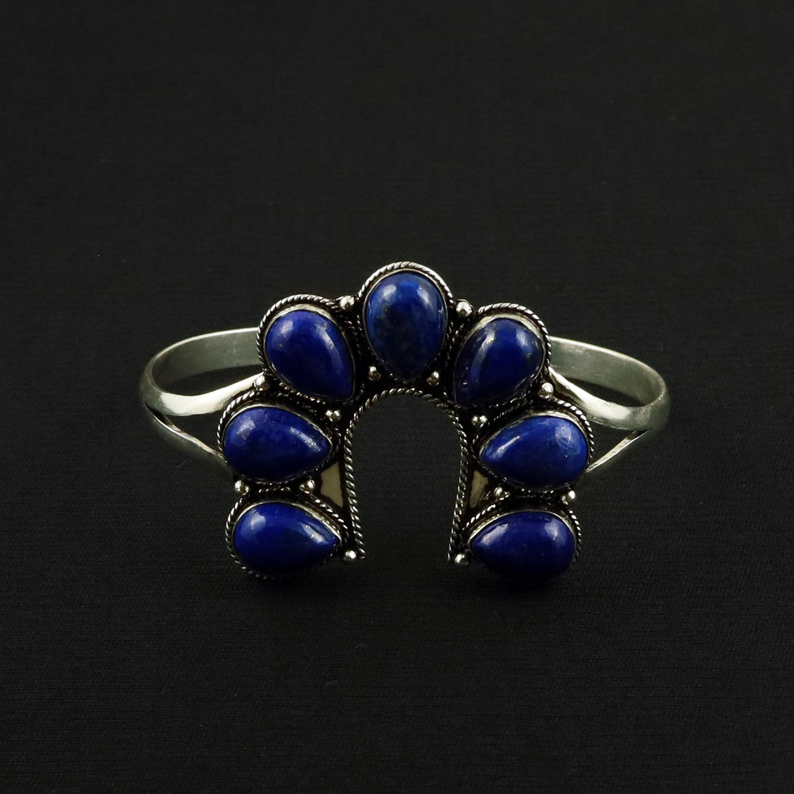 Natural Lapis Lazuli Sterling Silver Plated Handmade Cuff Bangle: Product ID: 260701143131 Product - Handmade Silver Plated Cuff Bangle Metal - 92.5 Sterling Silver Plated Bangle Size - 7x5 CM (Adjustable) Gemstone - Lapis Lazuli Gemstone Origin - Afghanistan Gemsto
