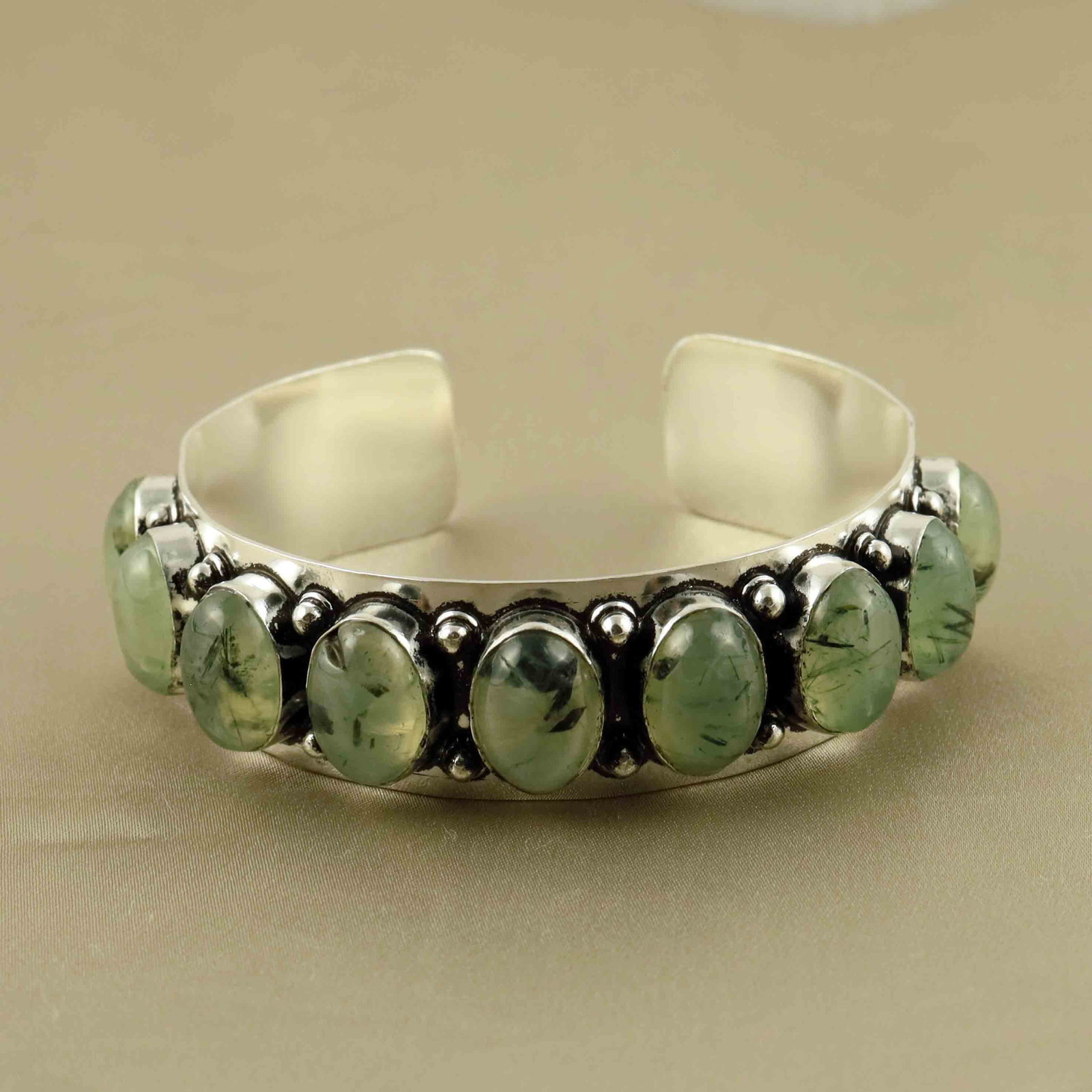 Natural Prehnite Sterling Silver Plated Handmade Cuff Bangle: Product ID: 260607150344 Product - Handmade Silver Plated Cuff Bangle Metal - 92.5 Sterling Silver Plated Bangle Size - 6.5x5.5 CM (Adjustable) Gemstone - Prehnite Gemstone Origin - South Africa Gemst