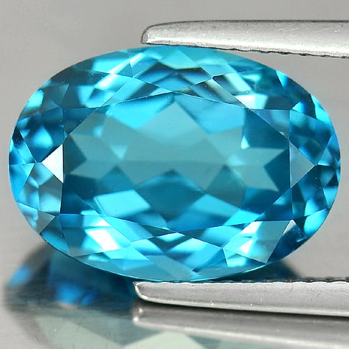 Natural London Blue Topaz Gemstones 7.62 Ct. Clean Oval Shape 14 x 10 Mm.: Product ID: 807165545 Product Name: Natural Blue Topaz Weight: 7.62 CT. Size: 14 x 10 x 6.8 MM. Shape: Oval Color: Blue Clarity:IF Luster: Good Gems Origin: Brazil Treatment: Treated Crystal Structure