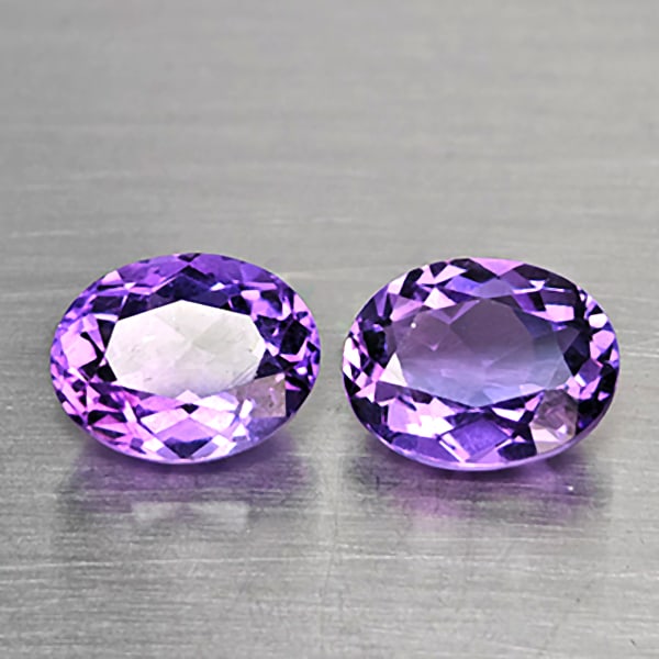 Natural Purple Amethyst Gemstones 5.28 Ct. 2 Pcs. Oval Shape 10.2 x 8 Mm.: Product ID: 800325669 Product Name: Natural Amethyst Weight: 5.28 CT. Size: 10.2 x 8 x 5.8 MM. Shape: Oval Shape Color: Purple Clarity:VSI Luster: Good Gems Origin: Brazil Treatment: Unheated Crystal 