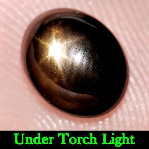 Natural Black Star Sapphire Gemstones 2.98 Ct. Oval Cabochon Shape 8.6 x 6.7 Mm.: Product ID: 806142798 Product Name: Natural Star Sapphire Weight: 2.98 CT. Size: 8.6 x 6.7 x 4.4 MM. Shape: Oval Cabochon Color: Black Clarity:Opaque Luster: Good 6 Rays Star Gems Origin: Thailand Tre