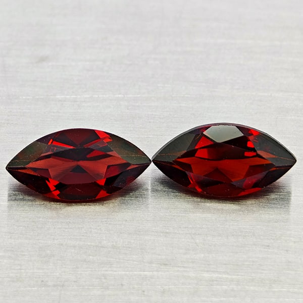 Natural Orangish Red Garnet Gemstones 2.71 Ct. 2 Pcs. Marquise Shape 5.1 x 10 Mm.: Product ID: 802936964 Product Name: Natural Garnet Weight: 2.71 CT. Size: 5.1 x 10 x 3.5 MM. Shape: Marquise Shape Color: Orangish Red Clarity:VVS - VSI Luster: Good Gems Origin: Tanzania Treatment: U