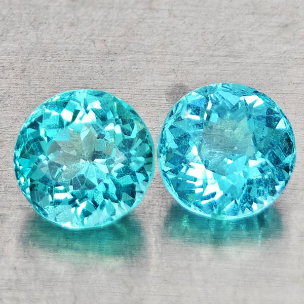 Natural Paraiba Color Apatite Gemstone 1.16 Ct. 2 Pcs. Round Shape 5 Mm.: Product ID: 800613640 Product Name: Natural Apatite Weight: 1.16 CT. Size: 5 x 5 x 3.6 MM. Shape: Round Color: Neon Blue Clarity:SI1 Luster: Good Gems Origin: Tanzania Treatment: Unheated Crystal Stru