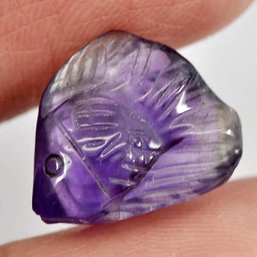 Natural Purple Amethyst Gemstones 5.82 Ct. Fish Carving 14.6 x 11.7 Mm.: Product ID: 810303314 Product Name: Natural Amethyst Weight: 5.82 CT. Size: 14.6 x 11.7 x 6.8 MM. Shape: Fish Carving Color: Purple Clarity:Semi - Transparent Luster: Good Gems Origin: Brazil Treatmen