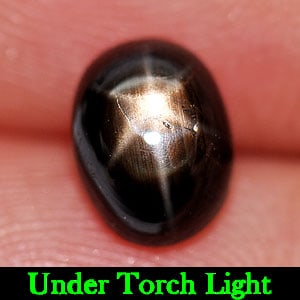 Natural Black Star Sapphire Gemstones 2.04 Ct. Oval Cabochon Shape 7.7 x 6 Mm.: Product ID: 806146068 Product Name: Natural Star Sapphire Weight: 2.04 CT. Size: 7.7 x 6 x 4.2 MM. Shape: Oval Cabochon Color: Black Clarity:Opaque Luster: Good 6 Rays Star Gems Origin: Thailand Treat