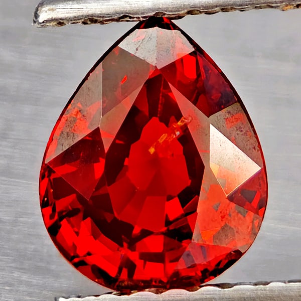 Natural Orangish Red Spessartine Garnet Gemstones 1.15 Ct. Pear Shape 7 x 5.8 Mm.: Product ID: 802937237 Product Name: Natural Garnet Weight: 1.15 CT. Size: 7 x 5.8 x 3.6 MM. Shape: Pear Shape Color: Orangish Red Clarity:SI1 Luster: Good Gems Origin: Namibia Treatment: Unheated Crys