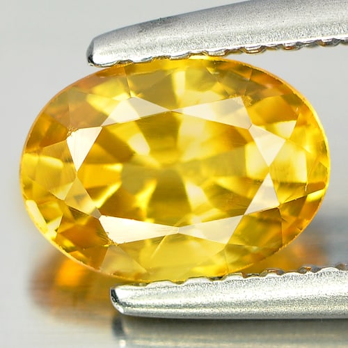 Natural Yellow Sapphire Gemstones 1.14 Ct. Clean Oval Shape 7 x 5 Mm.: Product ID: 806160793 Product Name: Natural Yellow Sapphire Weight: 1.14 CT. Size: 7 x 5 x 3.6 MM. Shape: Oval Color: Yellow Clarity:IF Luster: Very Good Gems Origin: Madagascar Treatment: Heated Crys