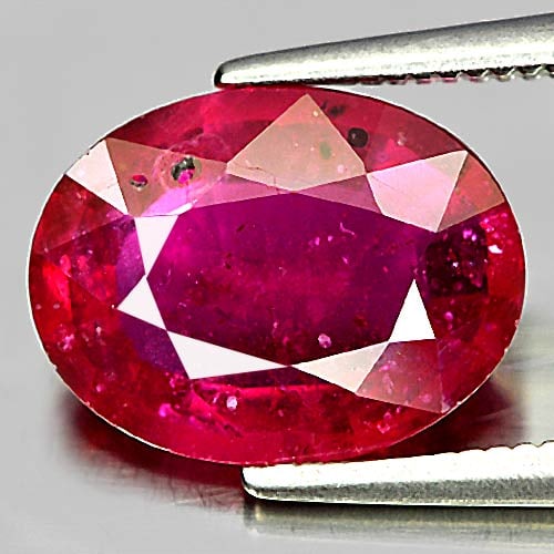Natural Purplish Red Ruby Gemstones 3.70 Ct. Oval Shape 11.2 x 8.5 Mm.: Product ID: 805917683 Product Name: Natural Ruby Weight: 3.70 CT. Size: 11.2 x 8.5 x 3.9 MM. Shape: Oval Color: Purplish Red Clarity:VSI Luster: Good Gems Origin: Mozambique Treatment: Heated (Lead-gl