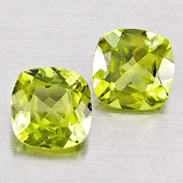 Natural Green Peridot Gemstones 1.65 Ct. 2 Pcs. Cushion Shape 6 x 3.5 Mm.: Product ID: 805317403 Product Name: Natural Peridot Weight: 1.65 CT. Size: 6 x 3.5 x 3.5 MM. Shape: Cushion Shape Color: Green Clarity:VSI Luster: Good Gems Origin: Pakistan Treatment: Unheated Crysta