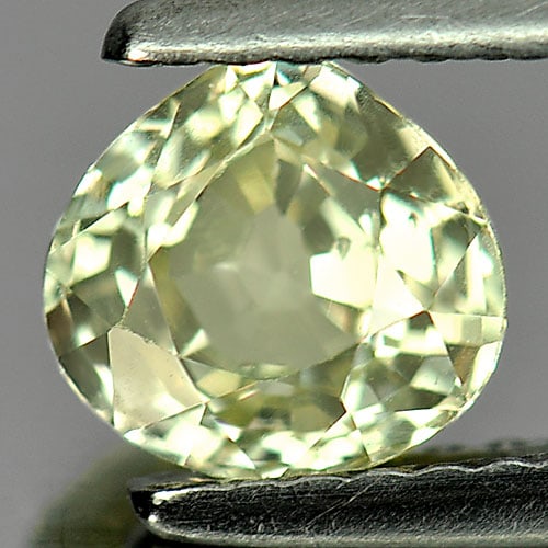 Natural Greenish Yellow Chrysoberyl Gemstones 1.15 Ct. Pear Shape 6.3 x 6 Mm.: Product ID: 801701085 Product Name: Natural Chrysoberyl Weight: 1.15 CT. Size: 6.3 x 6 x 3.9 MM. Shape: Pear Color: Yellow Clarity:VSI Luster: Good Gems Origin: Madagascar Treatment: Unheated Crystal 