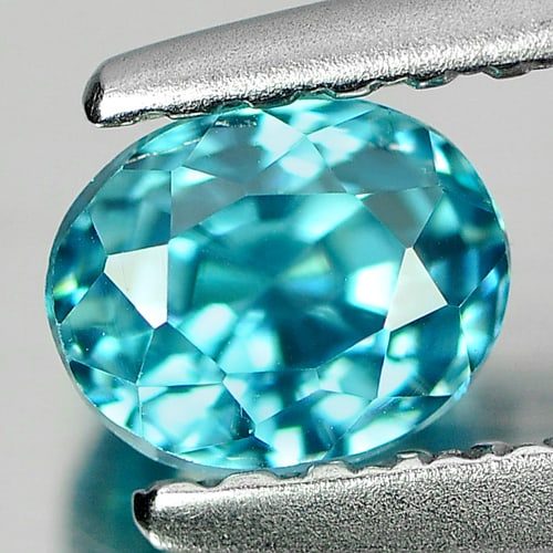 Natural Blue Zircon Gemstones 0.83 Ct. Clean Oval Shape 5.4 x 4.5 Mm.: Product ID: 807713033 Product Name: Natural Zircon Weight: 0.83 CT. Size: 5.4 x 4.5 x 4.4 MM. Shape: Oval Color: Blue Clarity:IF Luster: Good Gems Origin: Cambodia Treatment: Heated Crystal Structure: