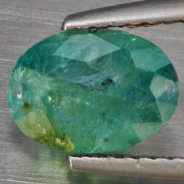 Natural Green Blueish Grandidierite Gemstones 1.79 Ct. Oval Shape 8.7 x 6.4 Mm.: Product ID: 803100114 Product Name: Natural Tsavorite Weight: 1.79 CT. Size: 8.7 x 6.4 x 4.4 MM. Shape: Oval Shape Color: Green Blueish Clarity:SI1 Luster: Good Gems Origin: Madagascar Treatment: Unhe