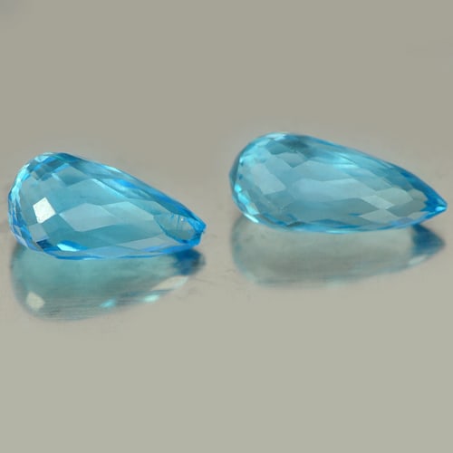 Natural Blue Topaz Gemstones 2.85 Ct. 2 Pcs. Briolette Shape 8.6 x 4.5 Mm.: Product ID: 807151224 Product Name: Natural Blue Topaz Weight: 2.85 CT. Size: 8.6 x 4.5 x 4.5 MM. Shape: Briolette Color: Blue Clarity:VVS Luster: Good Gems Origin: Brazil Treatment: Treated Crystal S
