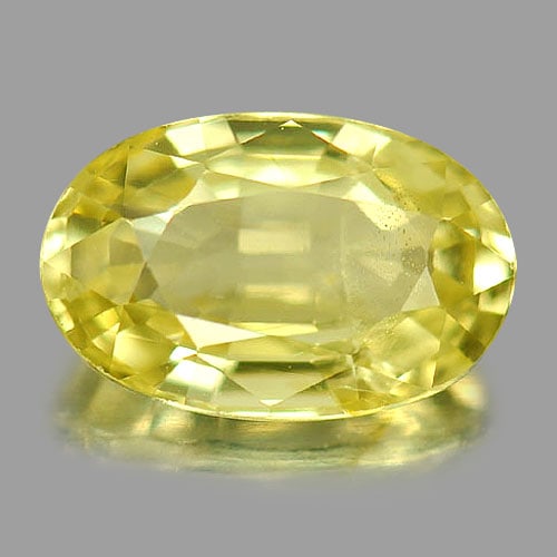 Natural Yellow Chrysoberyl Gemstones 1.29 Ct. Oval Shape 8 x 5.1 Mm.: Product ID: 801701090 Product Name: Natural Chrysoberyl Weight: 1.29 CT. Size: 8 x 5.1 x 3.4 MM. Shape: Oval Color: Yellow Clarity:VSI Luster: Good Gems Origin: Madagascar Treatment: Unheated Crystal 