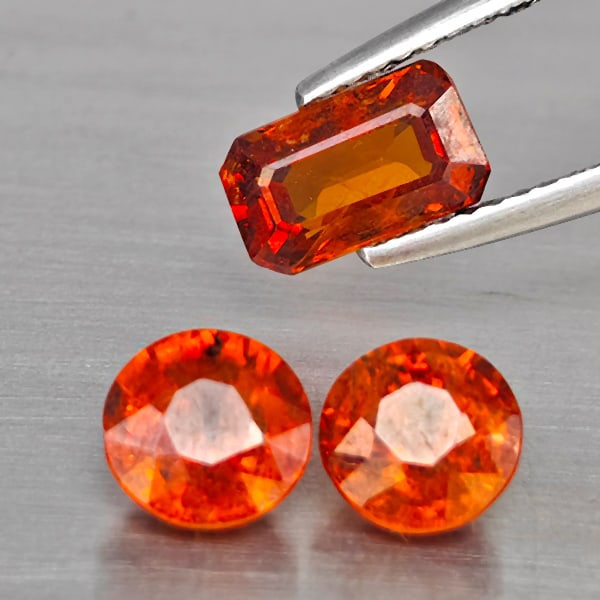 Natural Orangish Red Spessartine Garnet Gemstones 4.14 Ct. 3 Pcs. Mixed Shape and Mixed Size: Product ID: 802937922 Product Name: Natural Garnet Weight: 4.14 CT. Size: 8 x 4.9 x 3.9 to 6.4 x 6.4 x 3.9 MM. Shape: Mixed Shape Color: Orangish Red Clarity:SI1 Luster: Good Gems Origin: Namibia Trea