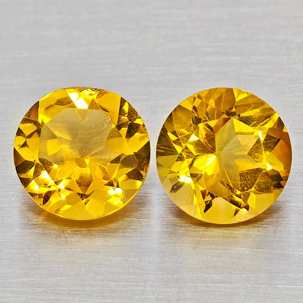 Natural Yellow Citrine Gemstones 2.23 Ct. 2 Pcs. Round Shape 7.2 Mm.: Product ID: 801815356 Product Name: Natural Citrine Weight: 2.23 CT. Size: 7.2 x 7.2 x 4.6 MM. Shape: Round Shape Color: Yellow Clarity:VSI - SI1 Luster: Good Gems Origin: Brazil Treatment: Unheated C