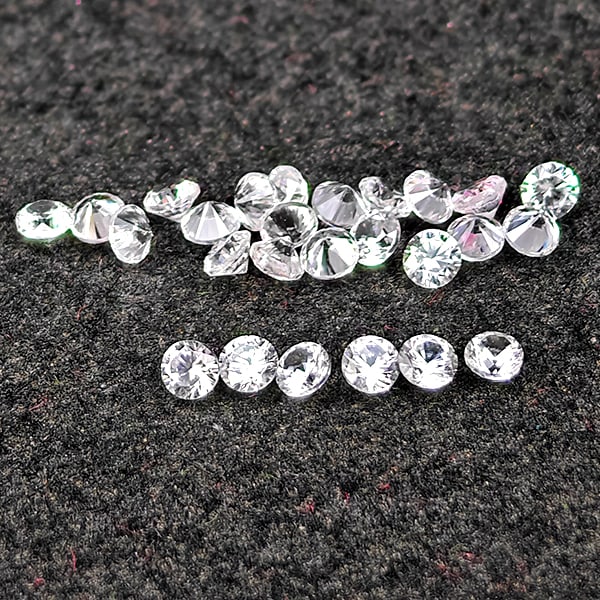 Natural White Zircon Gemstones 0.65 Ct. 30 Pcs. Round Diamond Cut 1.5 Mm.: Product ID: 807743117 Product Name: Natural Zircon Weight: 0.65 CT. Size: 1.5 x 1.5 x 1.2 MM. Shape: Round Diamond Cut Color: White Clarity:VSI Luster: Good Gems Origin: Cambodia Treatment: Heated Cry