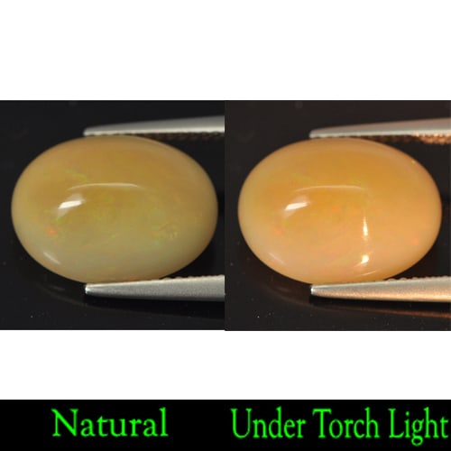 Natural Multi-Color Play Of Colour Opal Gemstones 5.75 Ct. Oval Cabochon Shape 14.7 x 11.2 Mm.: Product ID: 818707712 Product Name: Natural Opal Weight: 5.75 CT. Size: 14.7 x 11.2 x 7.3 MM. Shape: Oval Cabochon Color: Multi Color Clarity:Semi - Transparent Luster: Good Gems Origin: Ethiopia Trea