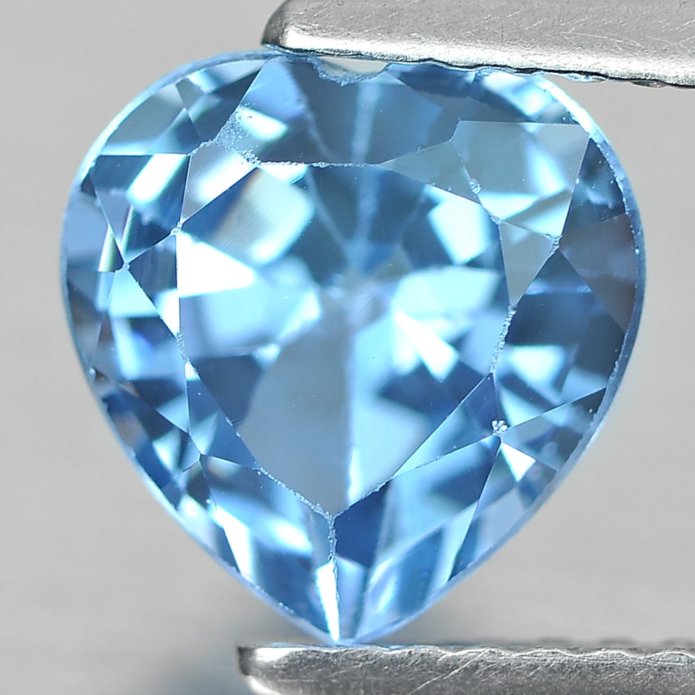Natural Blue Topaz Gemstones 2.21 Ct. Heart Shape 8 Mm.: Product ID: 807167322 Product Name: Natural Blue Topaz Weight: 2.21 CT. Size: 8 x 8 x 5 MM. Shape: Heart Color: Blue Clarity:SI1 Luster: Good Gems Origin: Brazil Treatment: Treated Crystal Structure: 