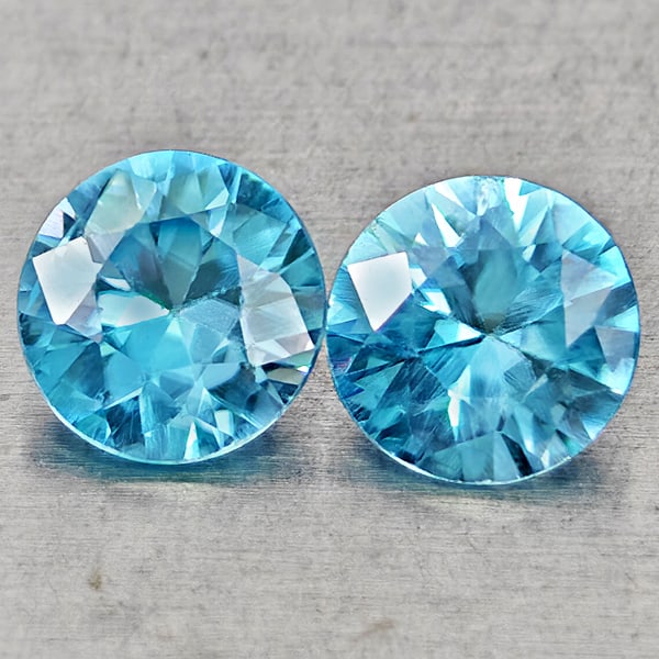 Natural Blue Zircon Gemstones 1.27 Ct. 2 Pcs. Round Diamond Cut 5 Mm.: Product ID: 807743042 Product Name: Natural Zircon Weight: 1.27 CT. Size: 5 x 5 x 2.9 MM. Shape: Round Diamond Cut Color: Blue Clarity:VSI Luster: Good Gems Origin: Cambodia Treatment: Heated Crystal 