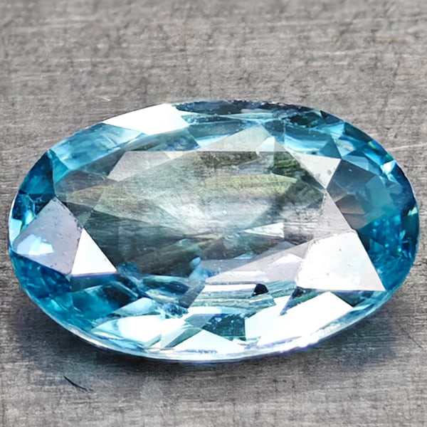 Natural Sky Blue Zircon Gemstones 1.14 Ct. Oval Shape 7.8 x 5.3 Mm.: Product ID: 107702394 Product Name: Natural Zircon Weight: 1.14 CT. Size: 7.8 X 5.3 X 2.6 MM. Shape: Oval Color: Sky Blue Clarity:VVS Luster: Good Gems Origin: Cambodia Treatment: Heated Crystal Struc