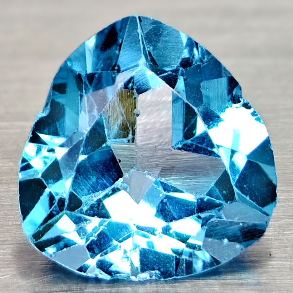 Natural Swiss Blue Topaz Gemstones 2.57 Ct. Trilliant Shape 9.1 Mm.: Product ID: 807167988 Product Name: Natural Blue Topaz Weight: 2.57 CT. Size: 9.1 x 9.1 x 4.5 MM. Shape: Trilliant Color: Swiss Blue Clarity:VSI Luster: Good Gems Origin: Brazil Treatment: Treated Cry