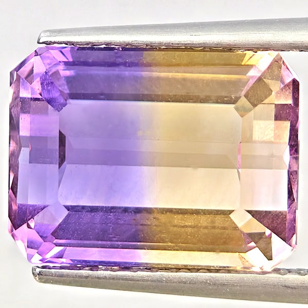 Natural Bi Color Ametrine Gemstones 7.13 Ct. Octagon Shape 12.6 x 9.6 Mm.: Product ID: 800408555 Product Name: Natural Ametrine Weight: 7.13 CT. Size: 12.6 x 9.6 x 7.4 MM. Shape: Octagon Color: Bi Color Clarity:VSI Luster: Good Gems Origin: Bolivia Treatment: Unheated Crysta