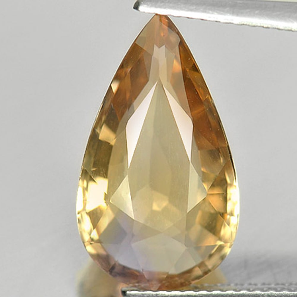 Natural Bi Color Ametrine Gemstones 5.79 Ct. Pear Shape 17.6 x 10 Mm.: Product ID: 800406957 Product Name: Natural Ametrine Weight: 5.79 CT. Size: 17.6 x 10 x 5.8 MM. Shape: Pear Color: Bi Color Clarity:VVS Luster: Good Gems Origin: Bolivia Treatment: Unheated Crystal St